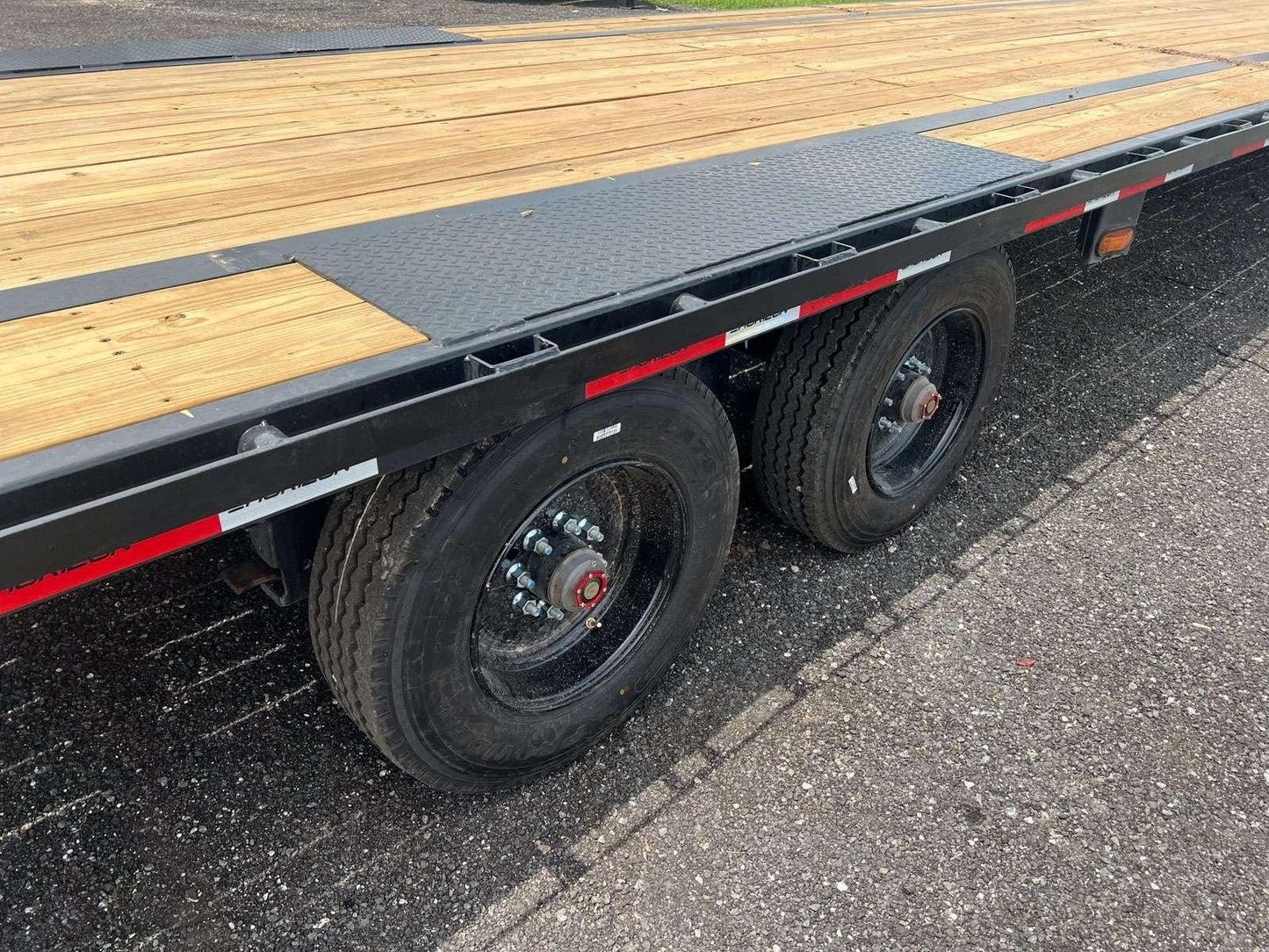 FTZ 40' Gooseneck (2) 10k Axles - Mega Ramps - 16k GVWR - 14ply Tires - 16# IB - Ratchet Rail FTZ40GN10KBKMR - Ghost 40ft Flatdeck with Mega Ramps - Stryker Dealership Group